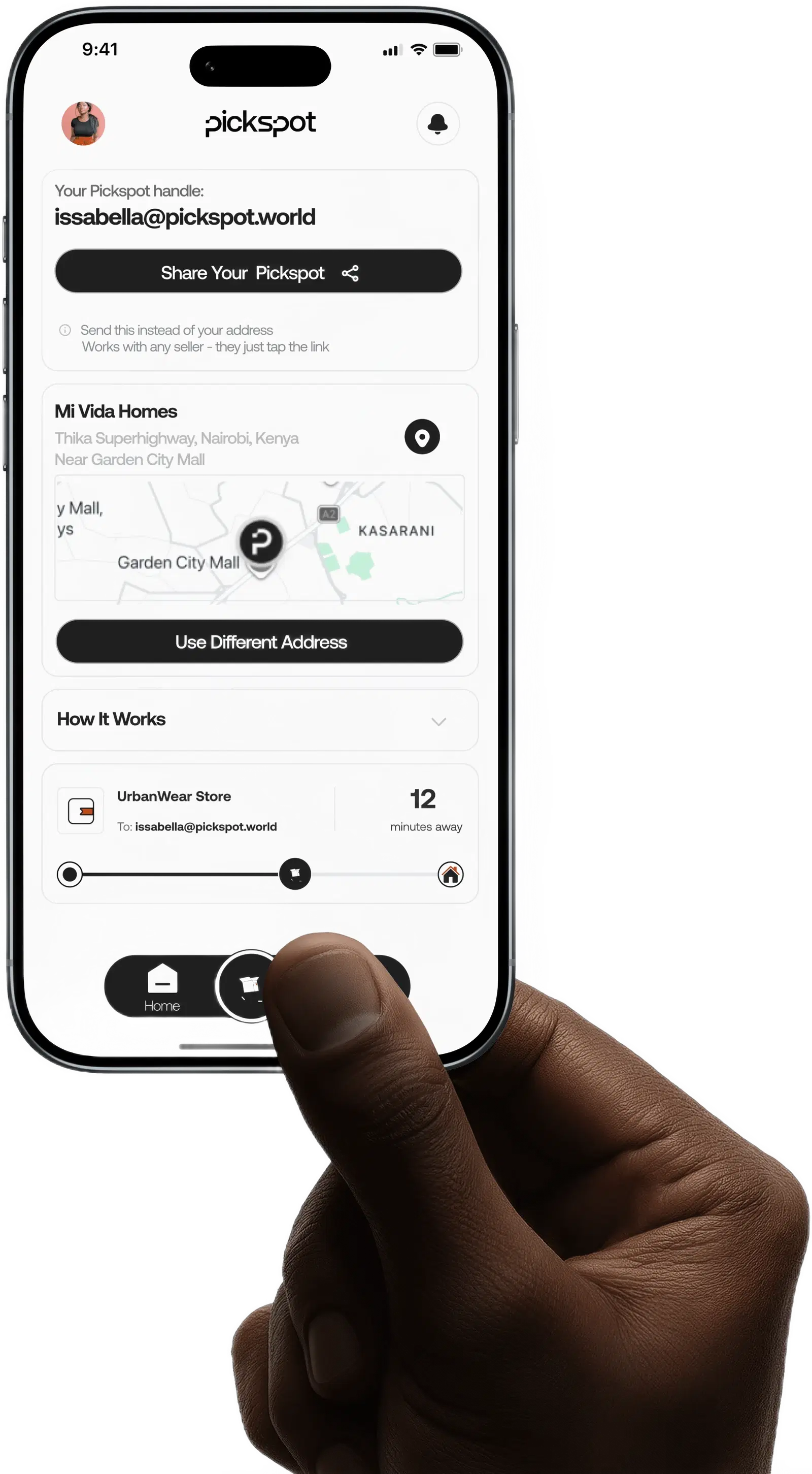 A shopper holding the PickSpot app